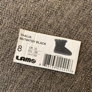 Water & Stain Resistant Suede Tassel Ankle Boots